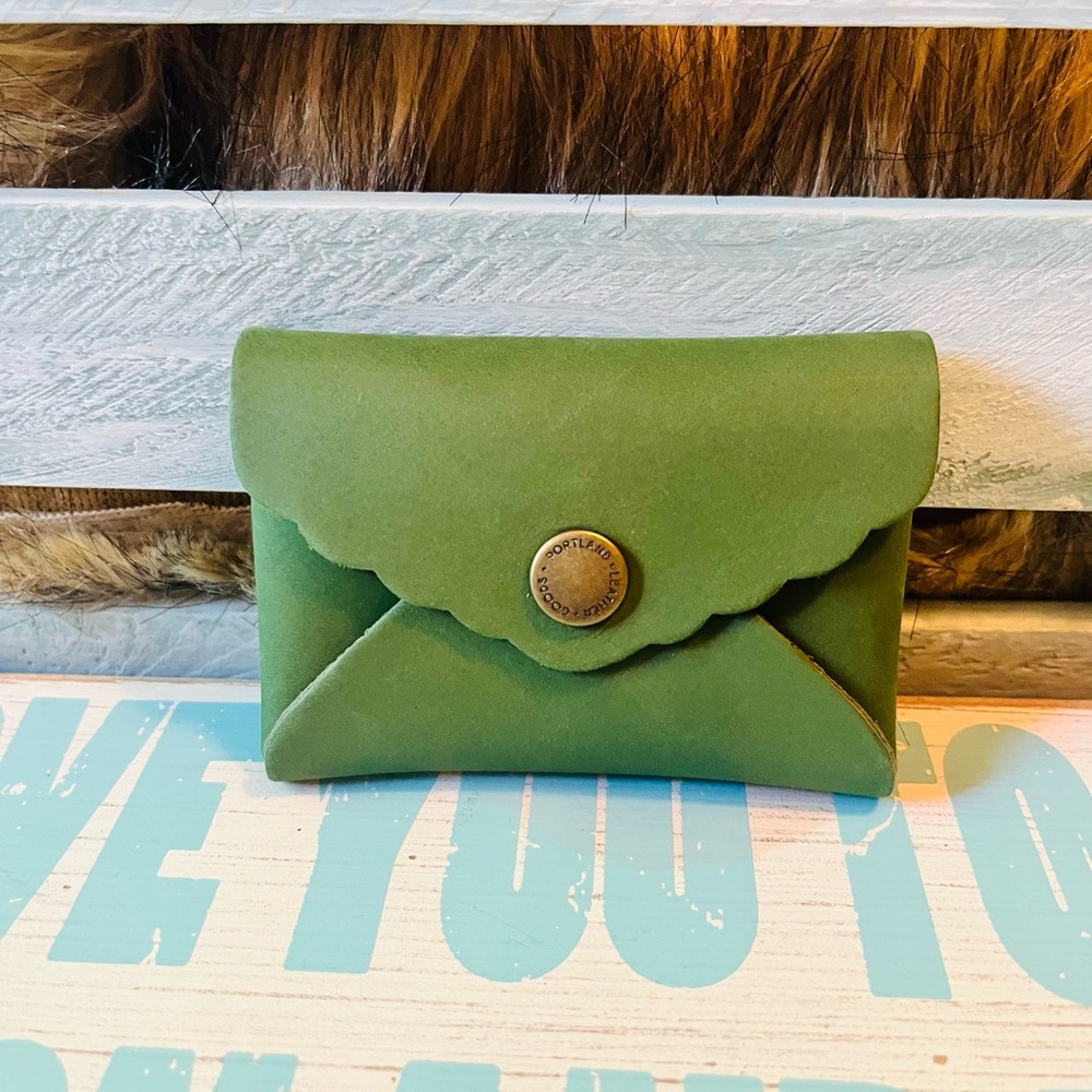Genuine leather daisy mini wallet. Color is Succulent. Brand New